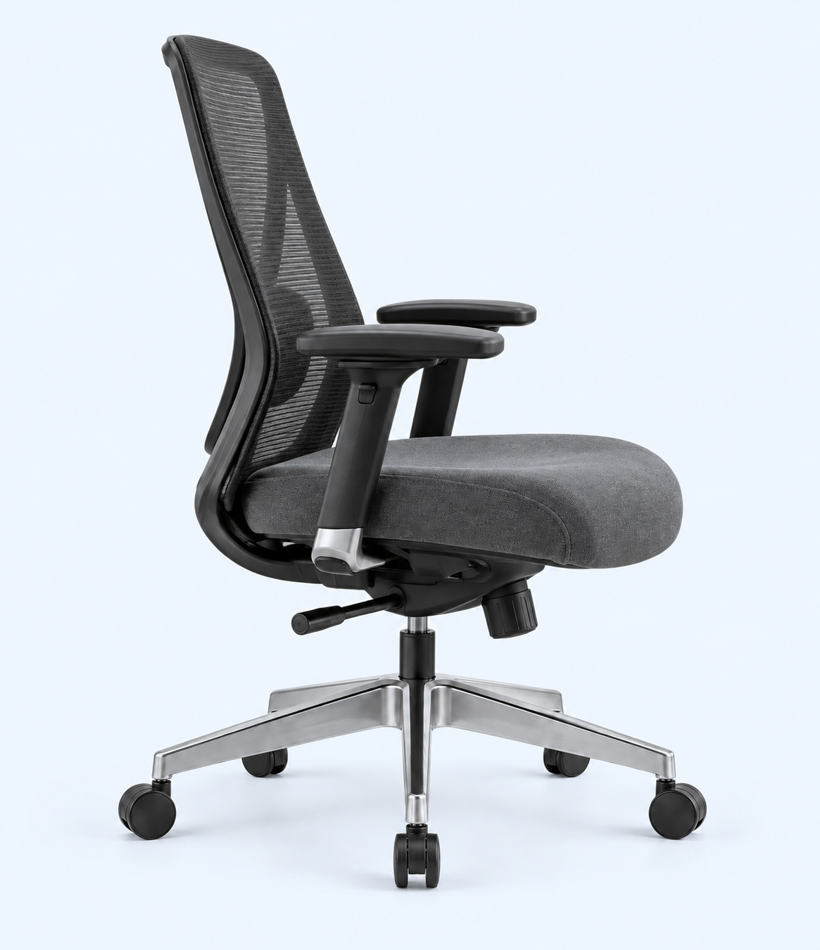 Side view of charcoal-grey mesh office chair with padded seat and armrests