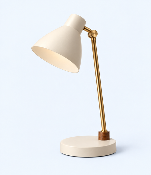 Side angled view of cream desk lamp showing shade joint and brown base collar