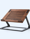 Wood-look laptop stand with slotted brown platform and black support frame, front view