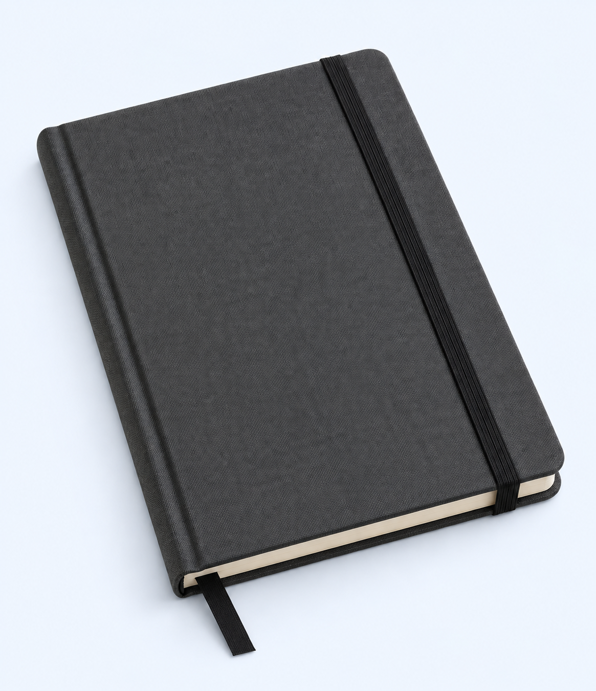 Charcoal-grey notebook lying flat with elastic band and ribbon bookmark