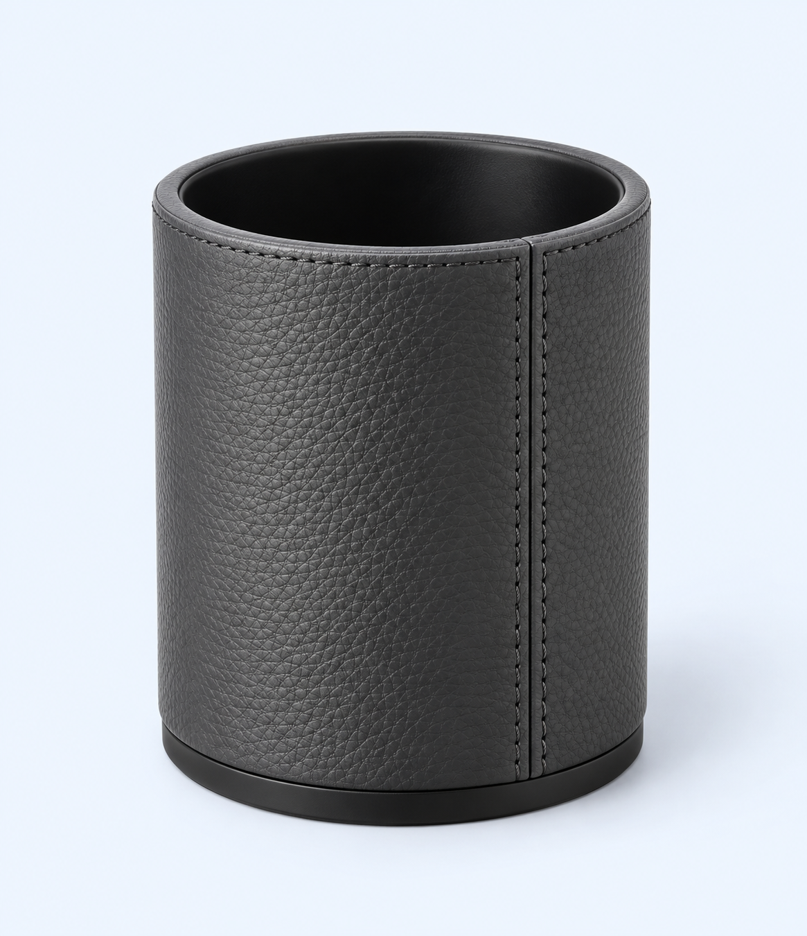 Charcoal-grey cylindrical pen holder with textured leather-look finish and stitched seam