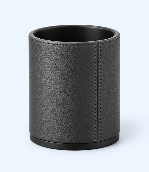 Front angled view of charcoal-grey pen holder showing black interior and base trim